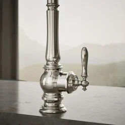 Touchless pull-down kitchen sink faucet with three-function sprayhead