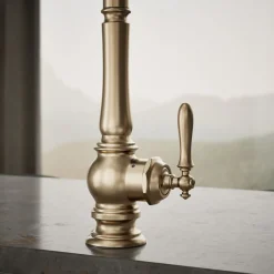 Touchless pull-down kitchen sink faucet with three-function sprayhead