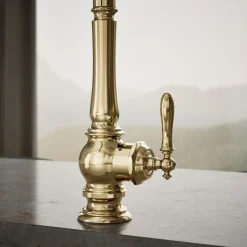 Touchless pull-down kitchen sink faucet with three-function sprayhead