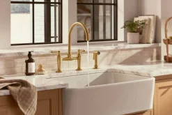Two-hole bridge kitchen sink faucet with side sprayer
