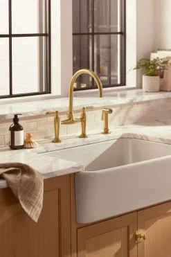 Two-hole bridge kitchen sink faucet with side sprayer