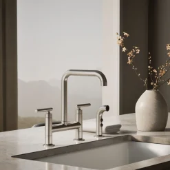 Two-hole bridge kitchen sink faucet with side sprayer