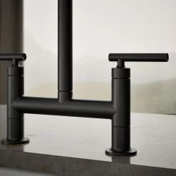 Two-hole bridge kitchen sink faucet with side sprayer