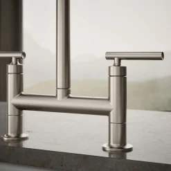 Two-hole bridge kitchen sink faucet with side sprayer