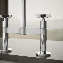 Two-hole bridge kitchen sink faucet with side sprayer