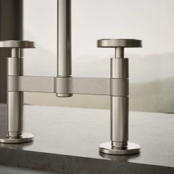 Two-hole bridge kitchen sink faucet with side sprayer