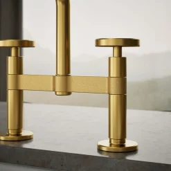 Two-hole bridge kitchen sink faucet with side sprayer