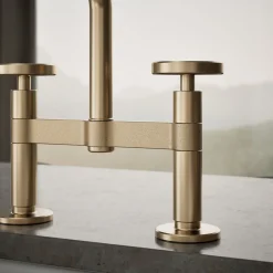 Two-hole bridge kitchen sink faucet with side sprayer