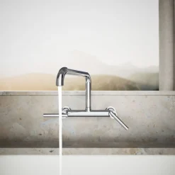Two-hole wall-mount bridge kitchen sink faucet