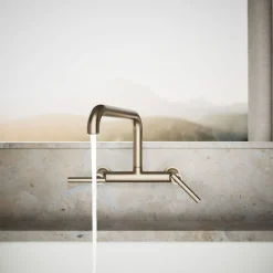 Two-hole wall-mount bridge kitchen sink faucet