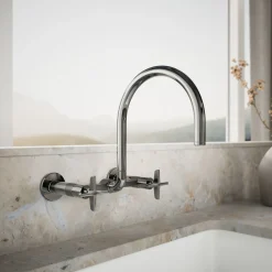 Two-hole wall-mount bridge kitchen sink faucet