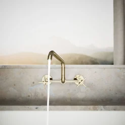 Two-hole wall-mount bridge kitchen sink faucet