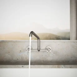 Two-hole wall-mount bridge kitchen sink faucet