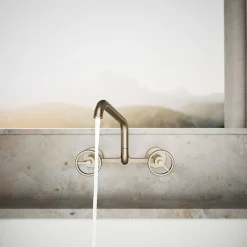 Two-hole wall-mount bridge kitchen sink faucet