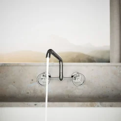 Two-hole wall-mount bridge kitchen sink faucet