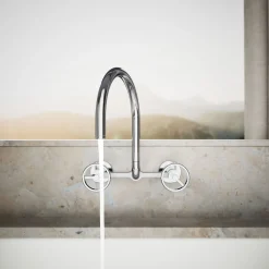 Two-hole wall-mount bridge kitchen sink faucet