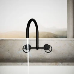 Two-hole wall-mount bridge kitchen sink faucet