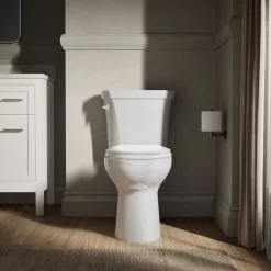 Two-piece elongated toilet, 1.28 gpf