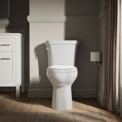 Two-piece elongated toilet, 1.28 gpf