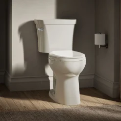 Two-piece elongated toilet, 1.28 gpf