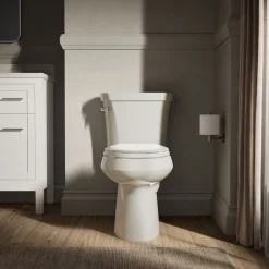 Two-piece elongated toilet, 1.28 gpf