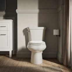 Two-piece elongated toilet, 1.28 gpf