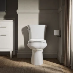 Two-piece elongated toilet, 1.28 gpf