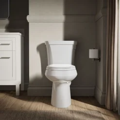 Two-piece elongated toilet, 1.28 gpf