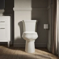Two-piece elongated toilet, 1.28 gpf