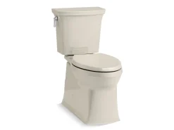 Two-piece elongated toilet with skirted trapway, 1.28 gpf