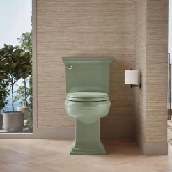 Two-piece elongated toilet with concealed trapway, 1.28 gpf