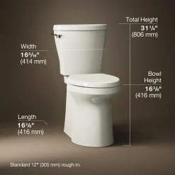 Two-piece elongated toilet with skirted trapway, 1.28 gpf