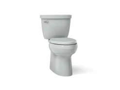 Two-piece elongated toilet with skirted trapway, 1.28 gpf