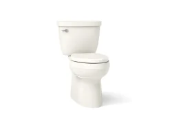 Two-piece elongated toilet with skirted trapway, 1.28 gpf