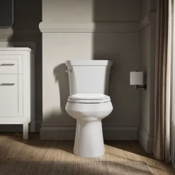 Two-piece elongated toilet with concealed trapway, 1.28 gpf
