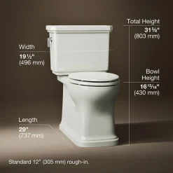 Two-piece elongated toilet with skirted trapway, 1.28 gpf