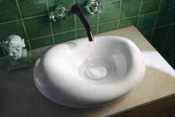 Wall-mount bathroom sink faucet handle trim