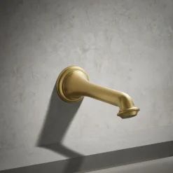 Wall-mount bath spout with turned design