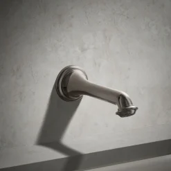 Wall-mount bath spout with turned design