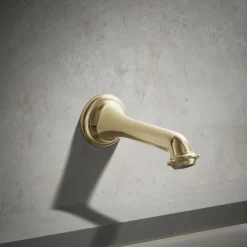 Wall-mount bath spout with turned design