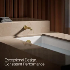 Wall-mount bath spout with turned design